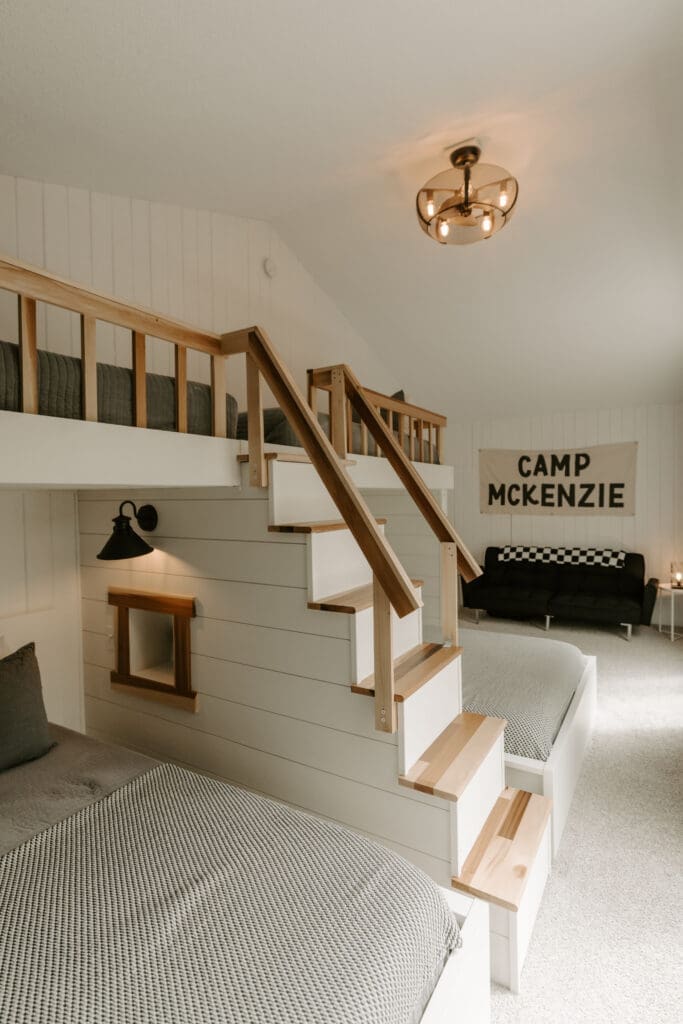 Spacious bunk room with multiple beds at Camp Digs in Northwestern Wisconsin