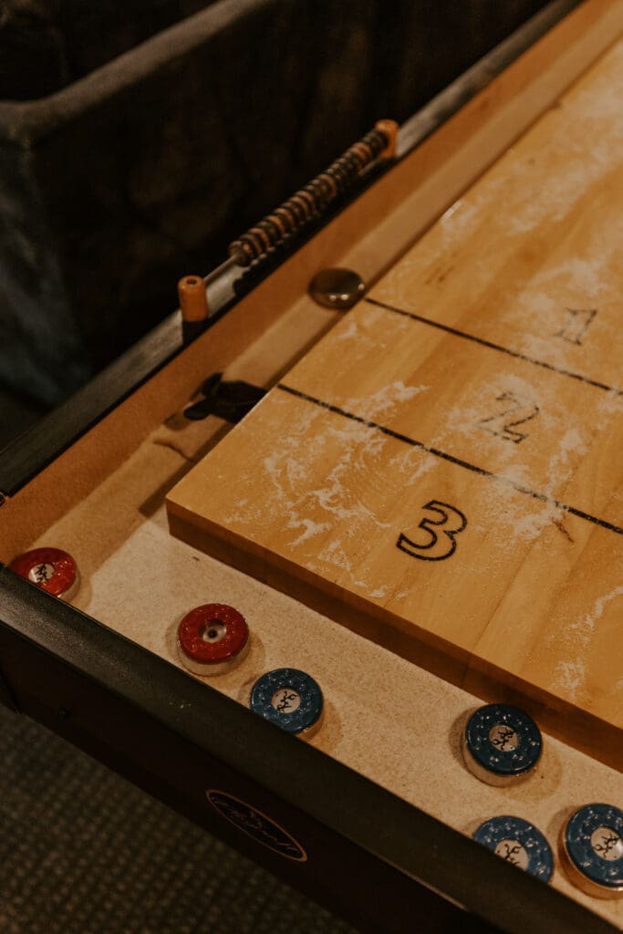 Family-friendly game room at Camp Digs featuring entertainment for all ages